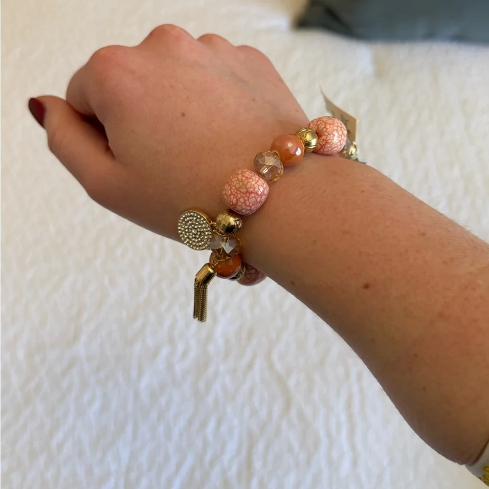 Beaded Stretch Bracelet w/ Gold Charms – Pink & Gold (Imperfection on tassel) - Picture 3 of 8